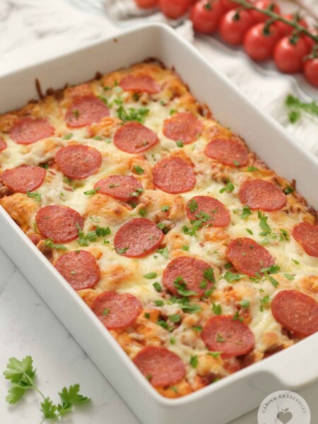 bubble pizza casserole in white baking dish