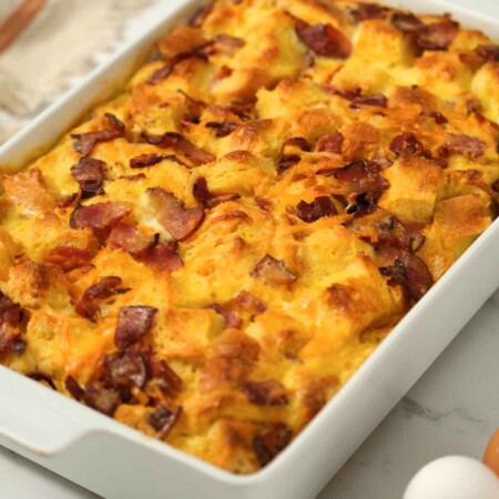 egg strata breakfast recipe in white casserole dish