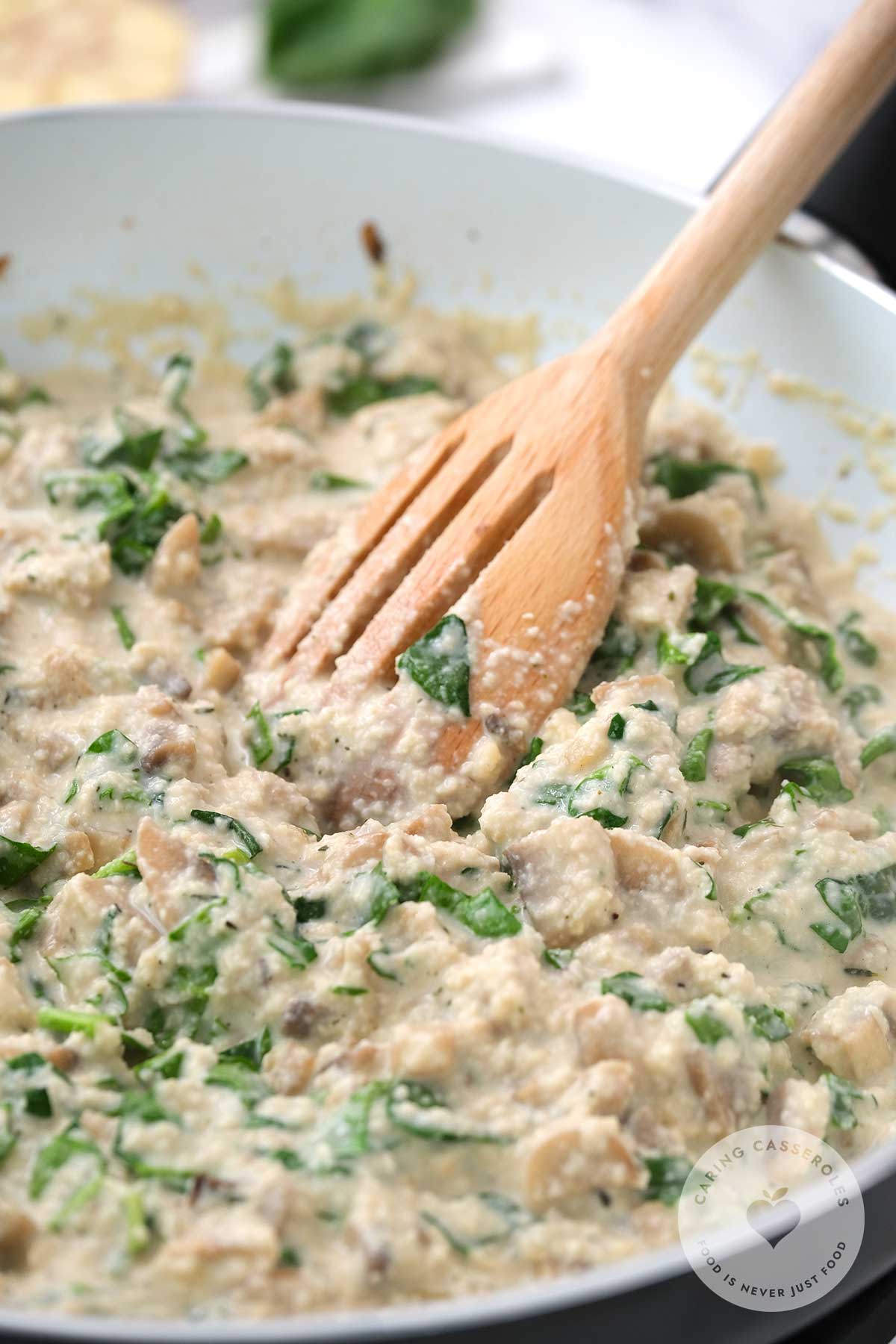 add chopped spinach to cashew cream mixture
