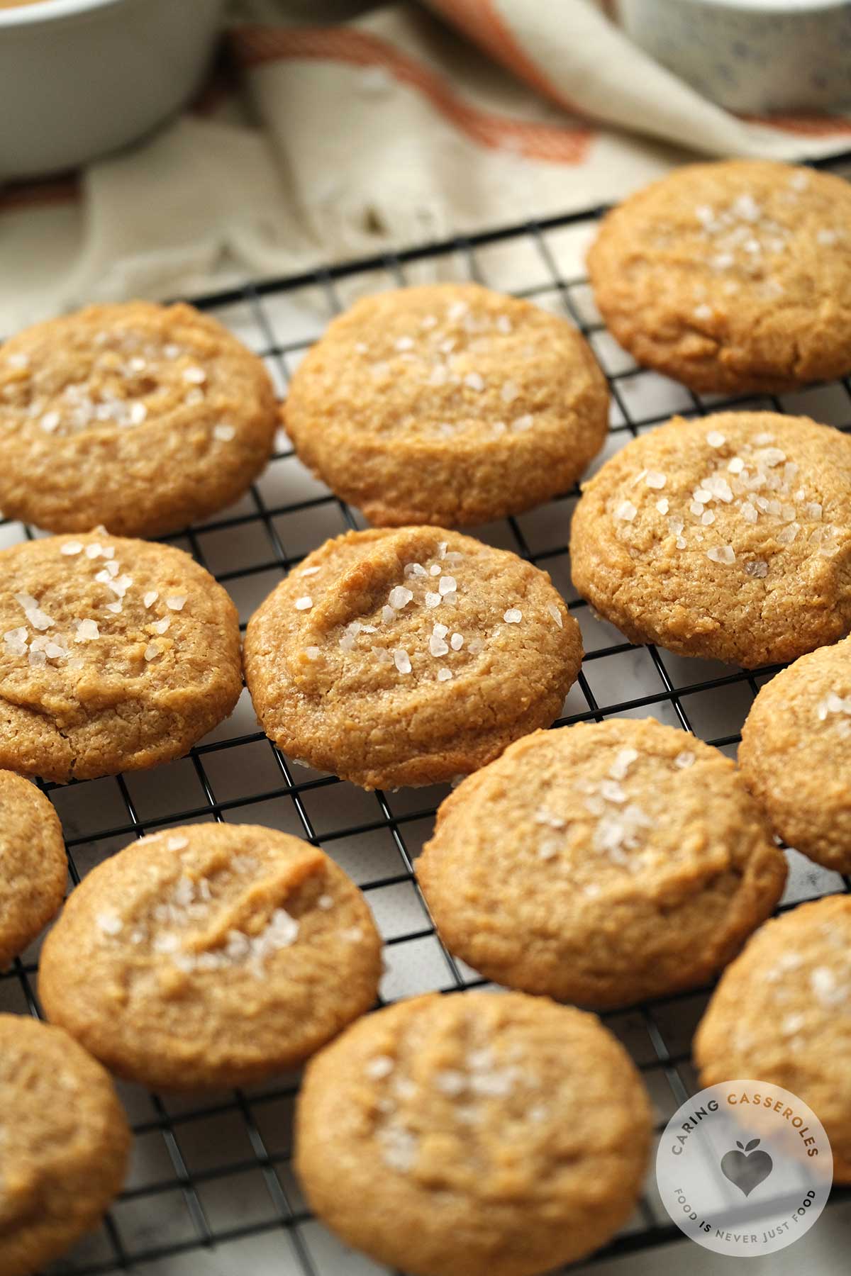 Peanut Butter cookies on a baking grid ready to be eaten.