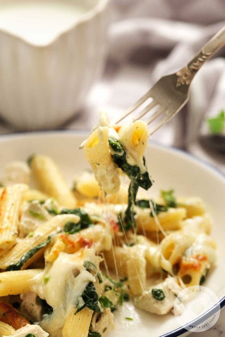 creamy spinach dip chicken on fork