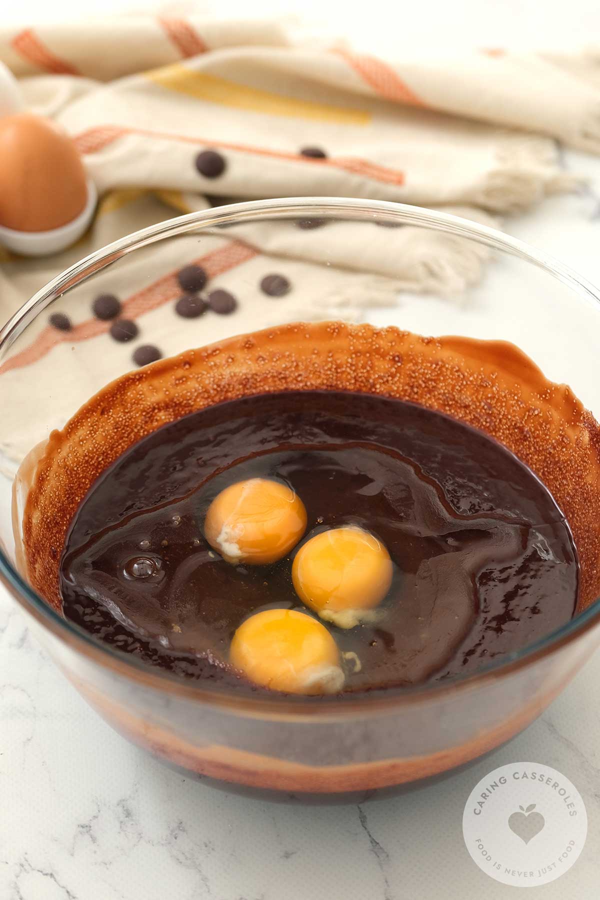 Eggs added in and whisked till the mixture is glossy. 
