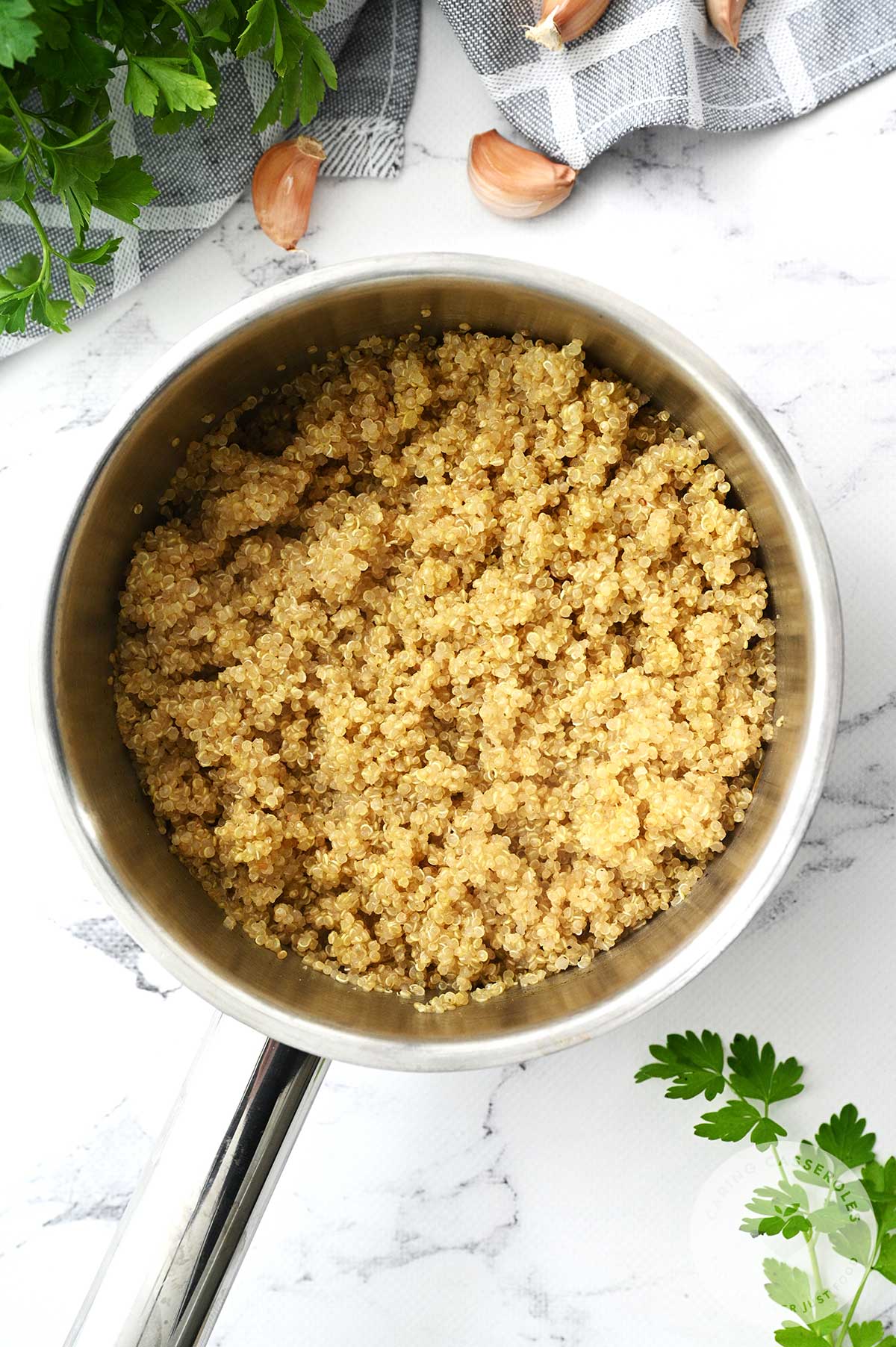 Quinoa cooked in a pot and ready to be used.