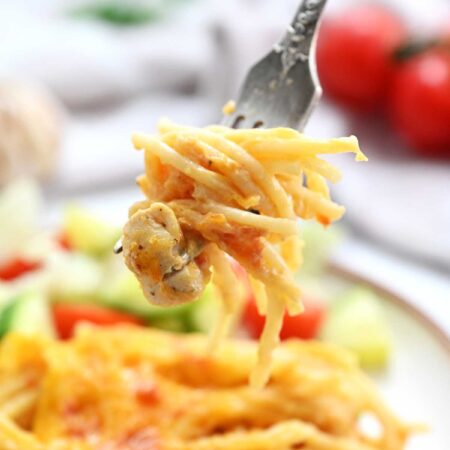 A portion of Chicken Spaghetti on a fork.