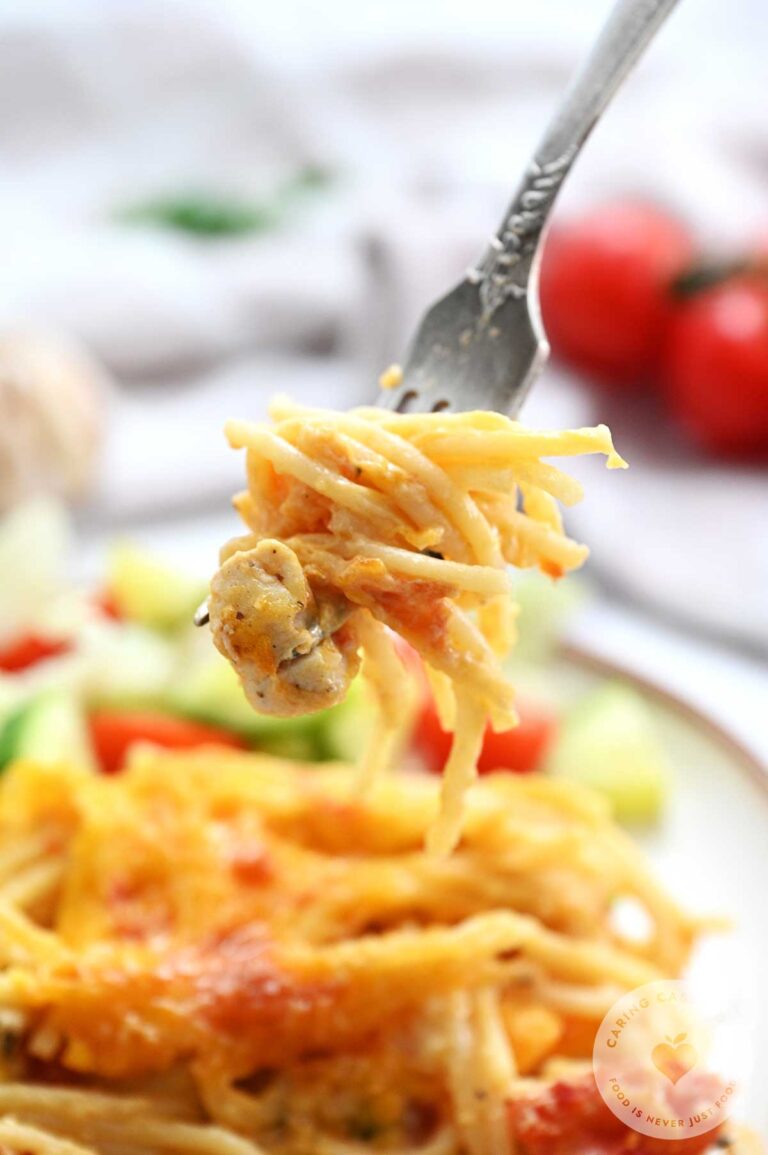 A portion of Chicken Spaghetti on a fork.