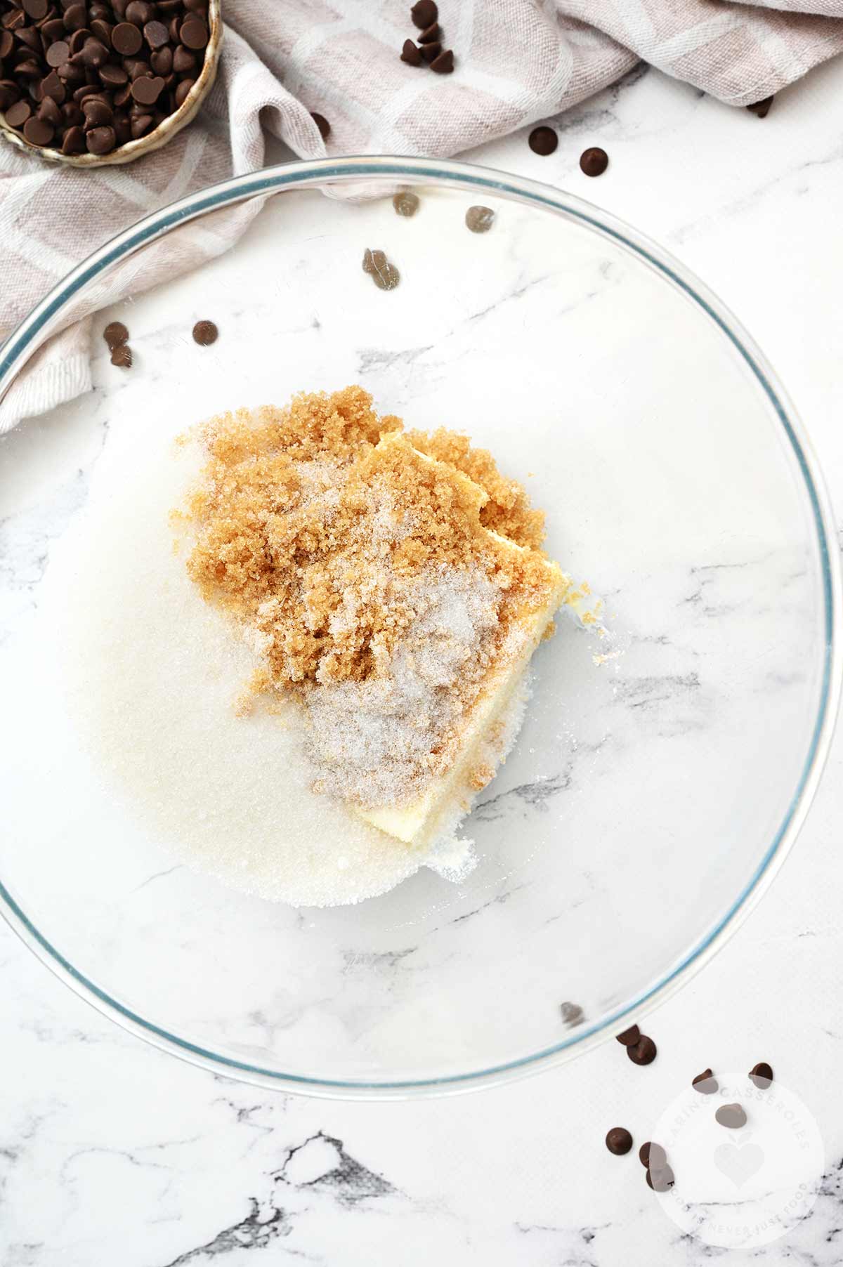 Butter and sugar in a bowl ready to be creamed together.