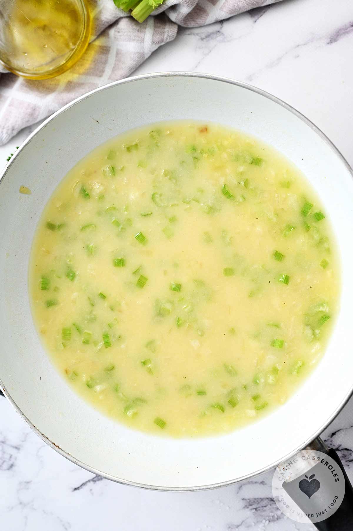 Wine, chicken broth and cream added to the onion and celery mix and reduced.