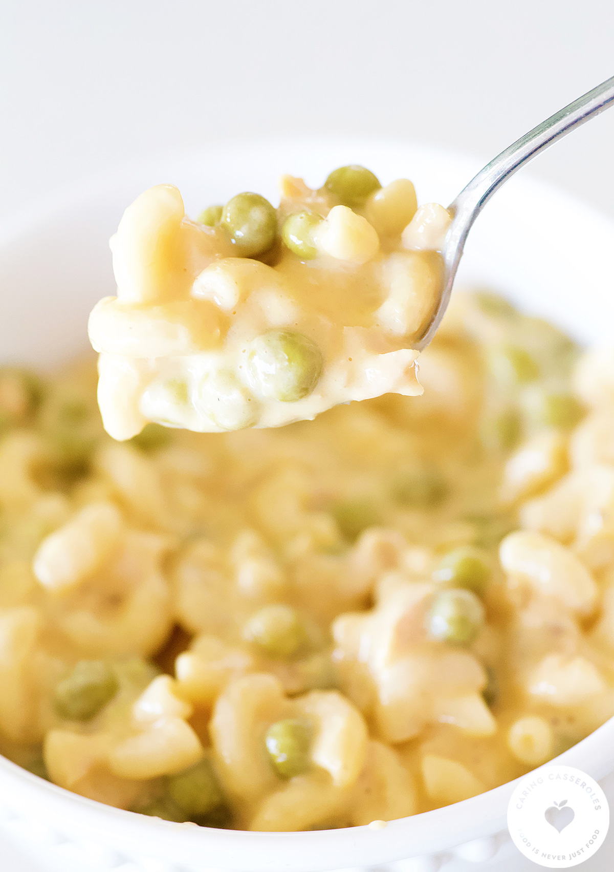 Easy cheesy tuna casserole prepared from a meal in a bag pantry meal kit.spoon